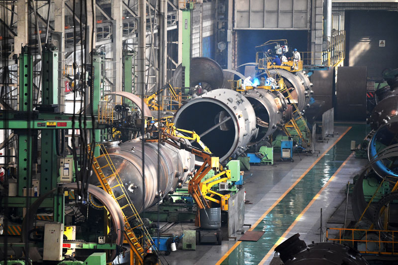 圖為2月23日，工人在哈電集團哈爾濱鍋爐廠有限責任公司的生產車間作業。（新華社記者 王建威 攝）