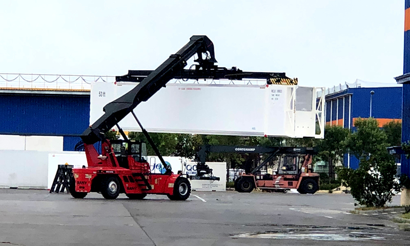 圖為轉運成品集裝箱。（國務院國資委網站 陳航 攝）